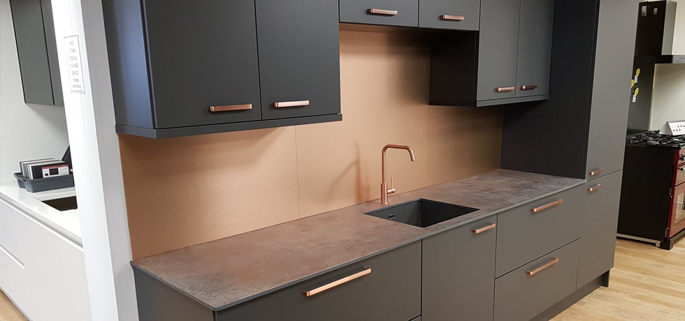 Evolve Caldeira on display at Homecare Supplies, with Brushed Copper splashback 